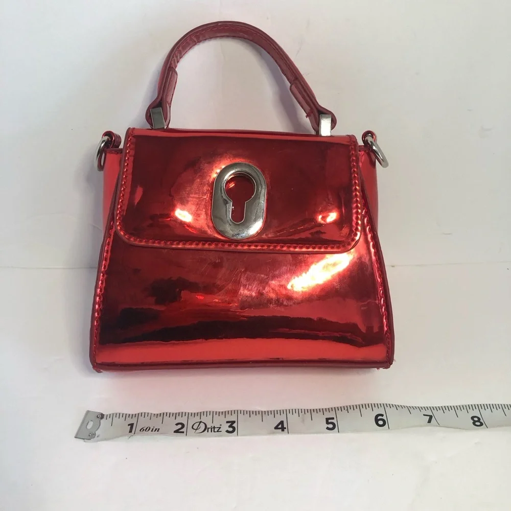 Skinny Dip Shiny Small Red Handbag. Coca-Cola Inner Lining. Magnet Closure. - Picture 8 of 9